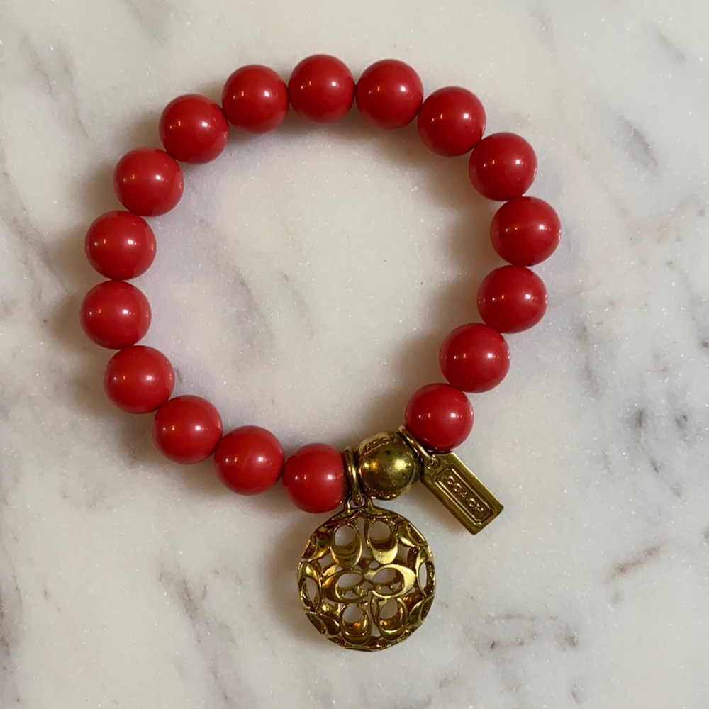 Red Orange Coach bracelet